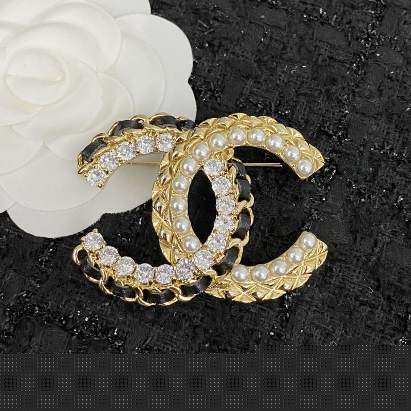 Ch*el brooches